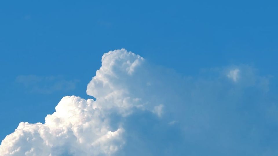Photo of clouds illustrates positive impacts of utilizing treatments prescribed by Dr. John Sarno to reduce chronic pain.