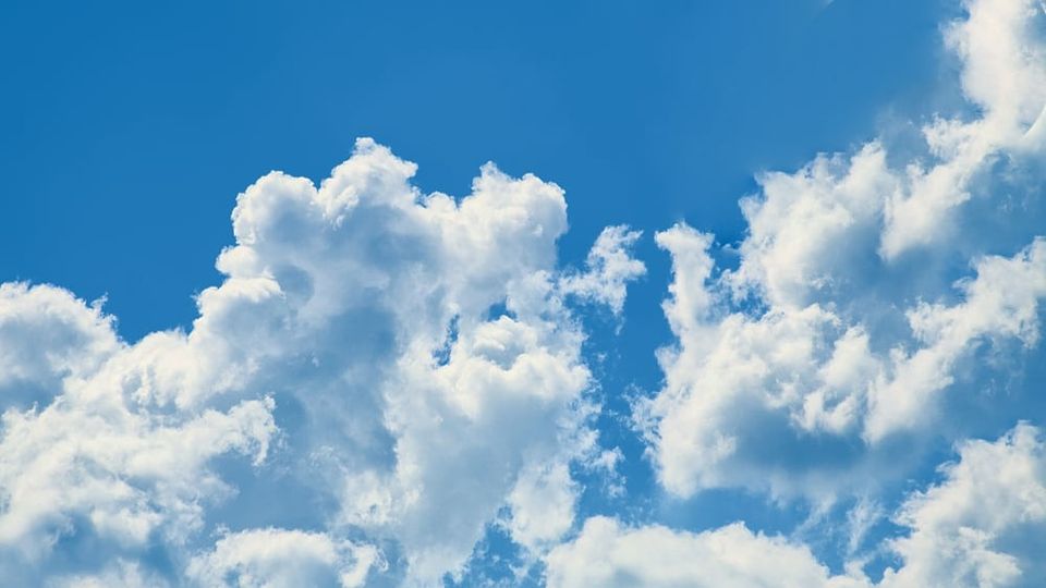 Photo of clouds illustrates how using treatments prescribed by Dr. John Sarno reduces headache and migraine pain.
