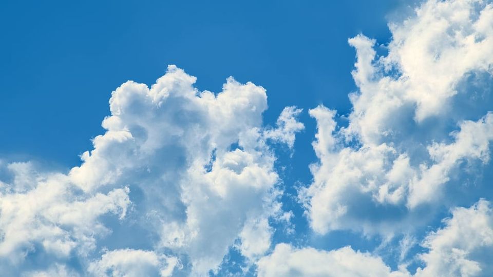 Photo of clouds depicts the relief from headache and migraine pain through mind-body treatments developed by Dr. John Sarno.