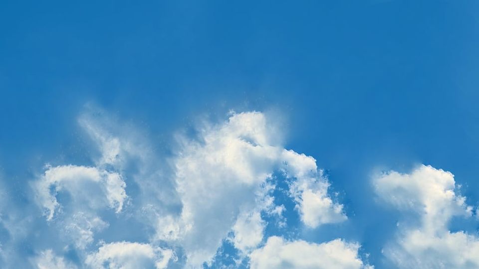 Photo of clouds illustrates how using treatments prescribed by Dr. John Sarno can eliminate neck pain.