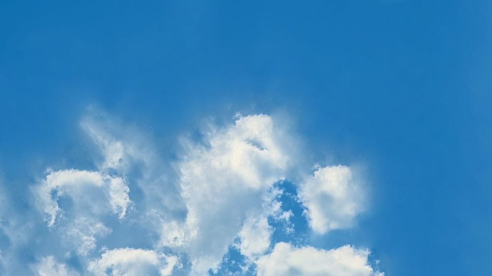 Photo of clouds illustrates the relief from neck pain by using mind-body techniques developed by Dr. John Sarno.