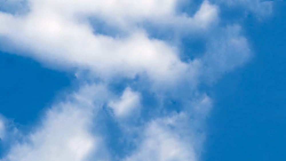 Photo of clouds illustrates the dissipation of headache and migraine pain by using techniques developed by Dr. John Sarno.