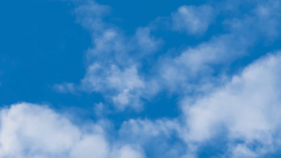 Photo of clouds shows how reading Dr. John Sarno’s book and journaling dissipated crippling chronic back pain.